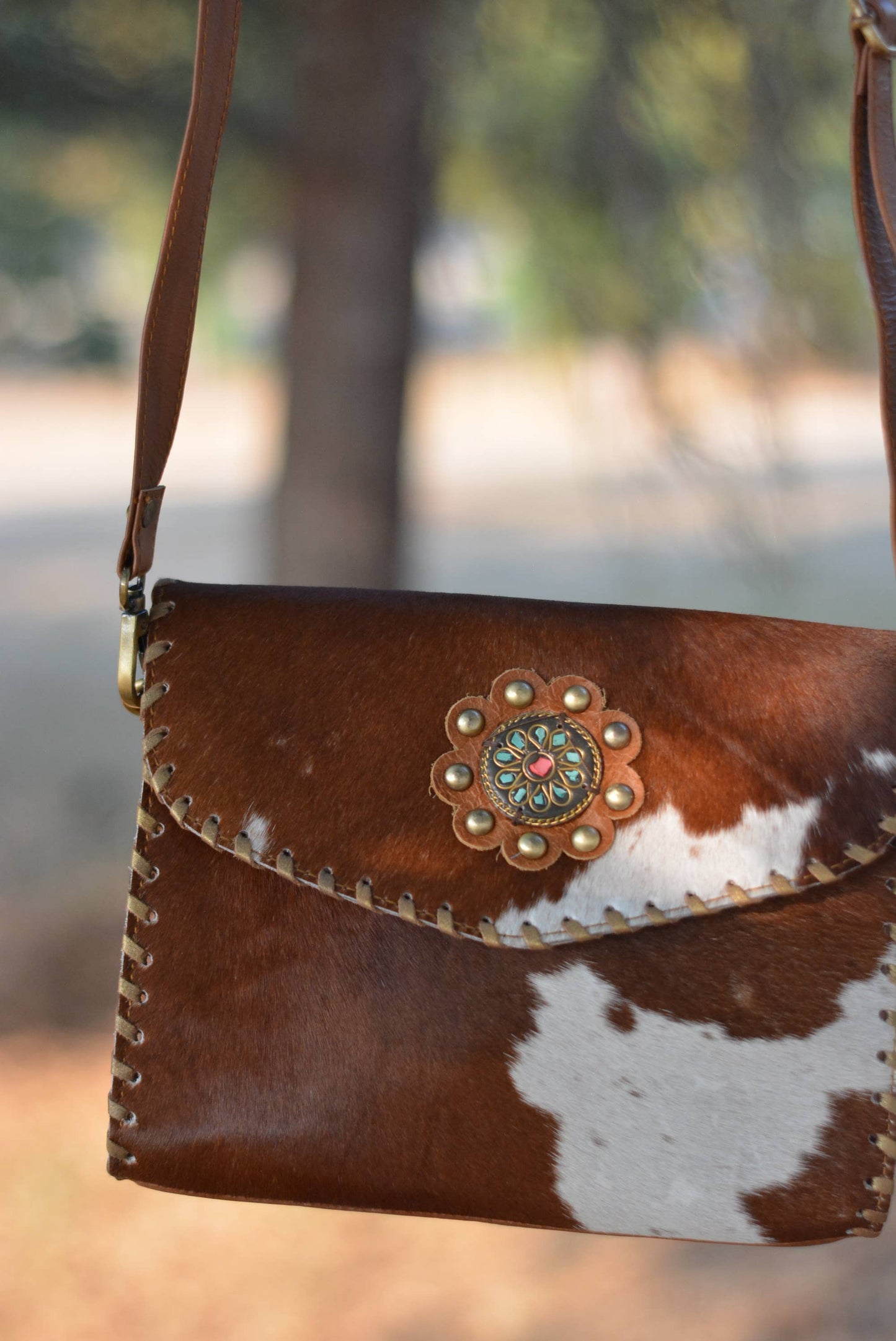 Cowhide Crossbody Bag with Concho Detail