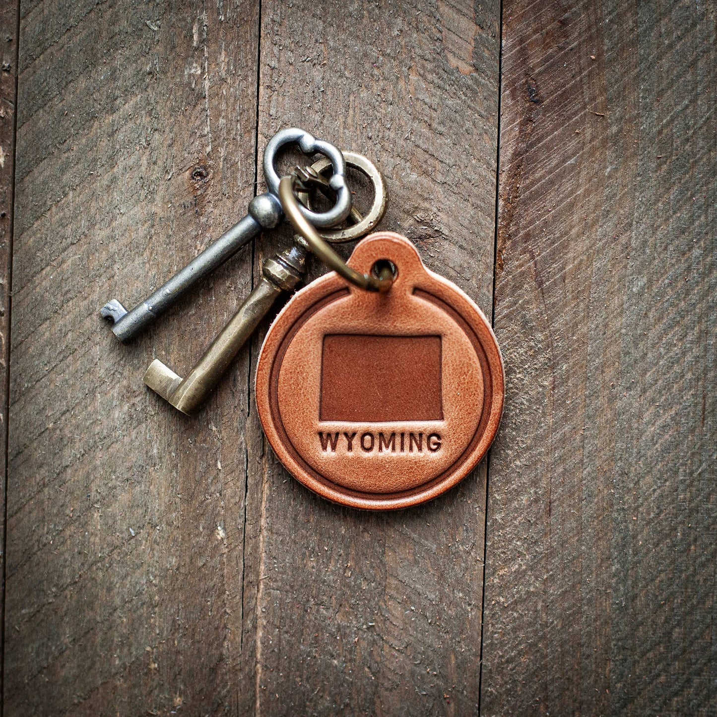 Wyoming State Silhouette Leather Keychain