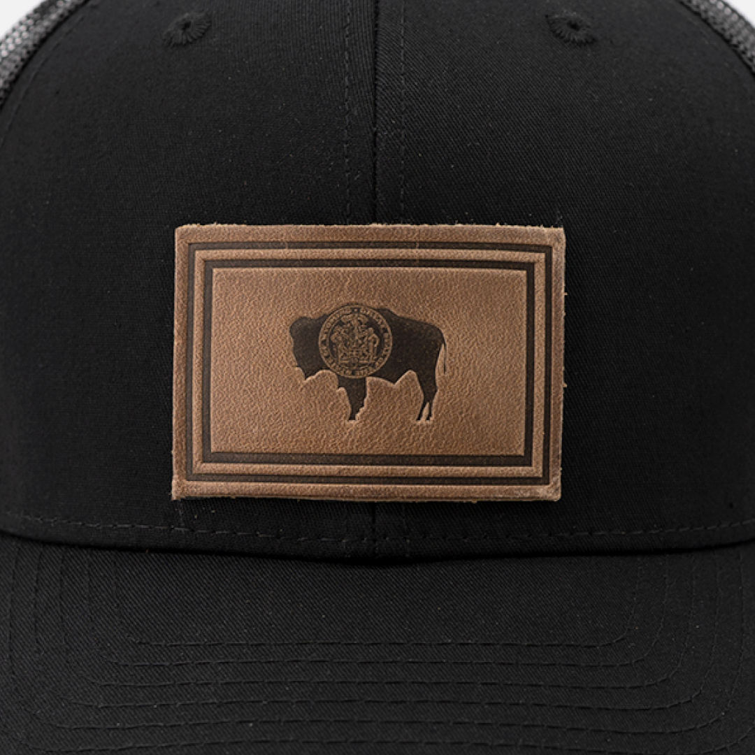 Wyoming Flag Hat | Leather Patch Trucker Hat