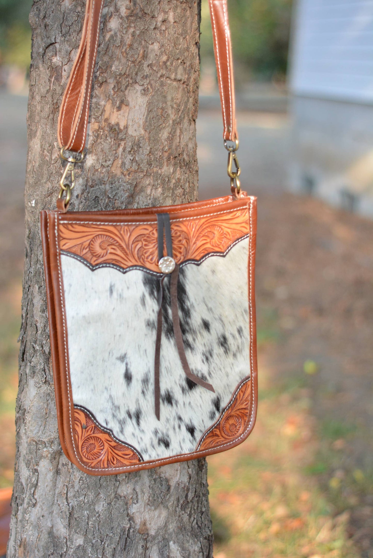 Tooled cowhide crossbody