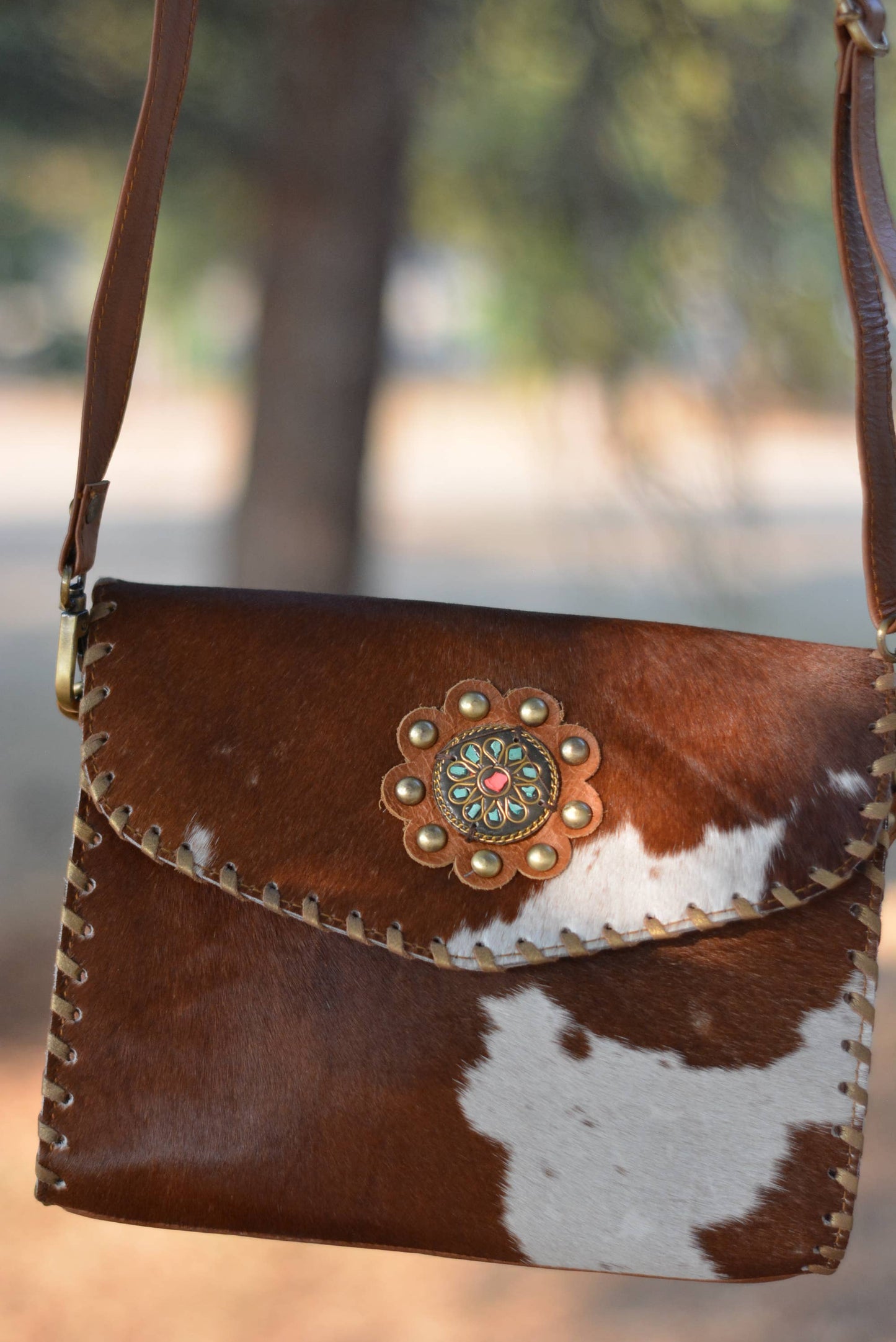 Cowhide Crossbody Bag with Concho Detail
