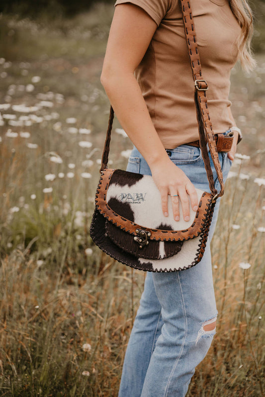 Hand stitched cowhide bag