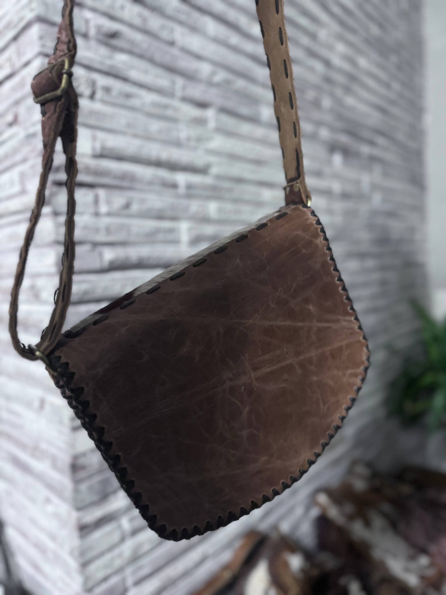 Hand stitched cowhide bag