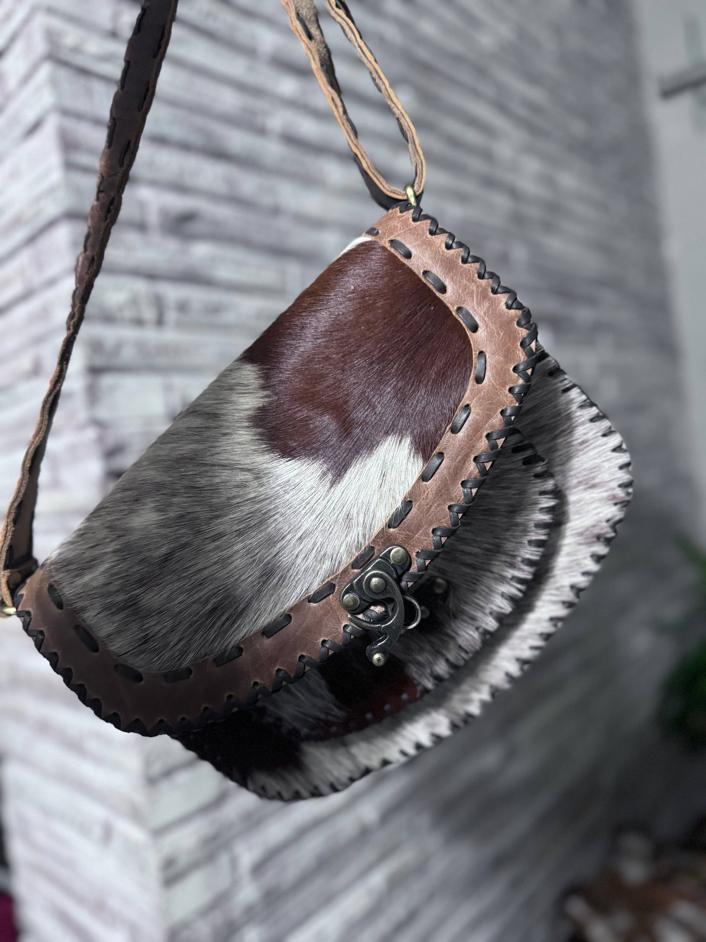 Hand stitched cowhide bag